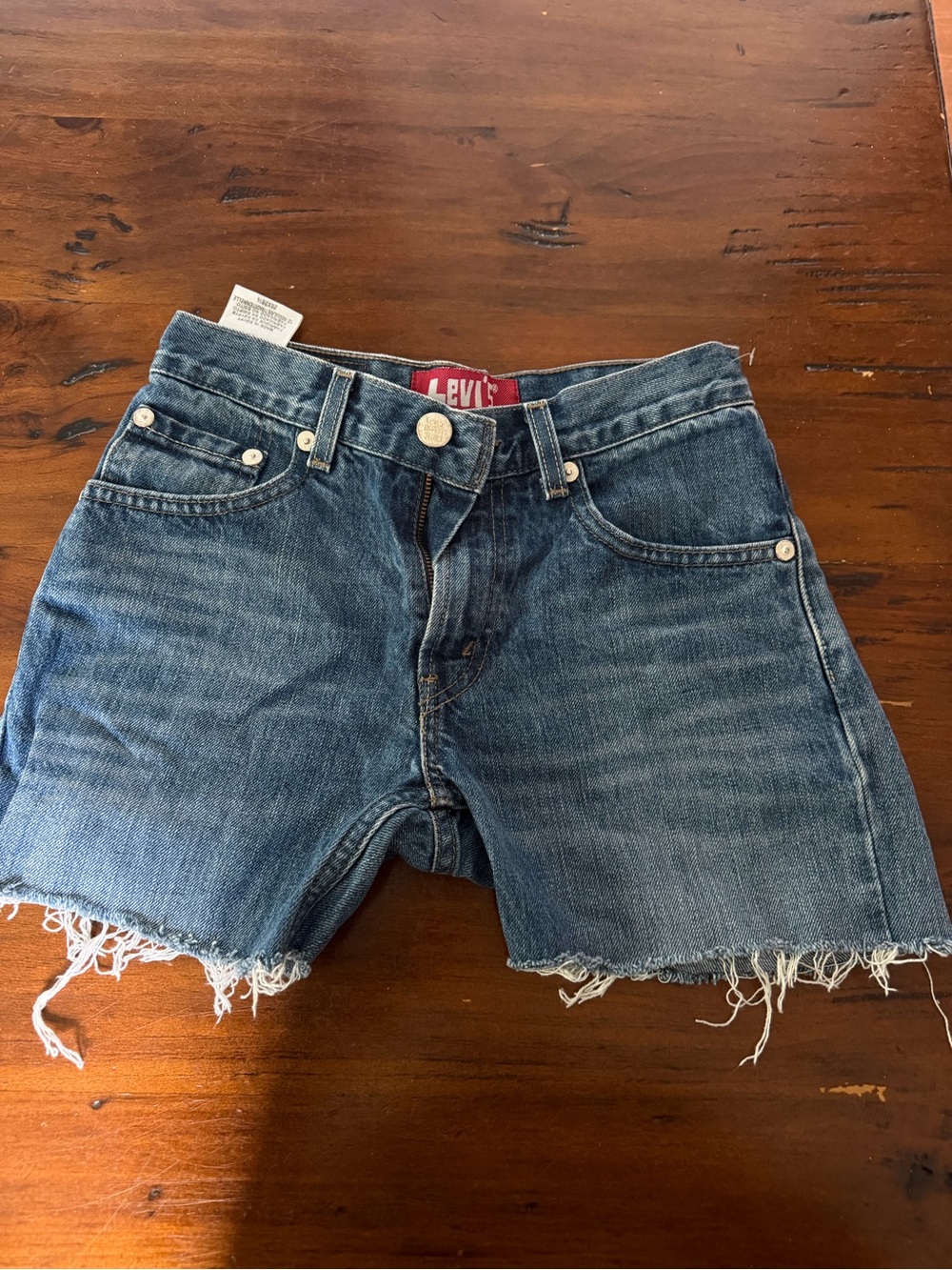 Levi's 505 High-Rise Denim Shorts in Medium Blue with Brown Patch